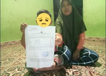 Ida Farida binti Sakmin bersama keponakannya AAR yang diduga menjadi korban penganiayaan